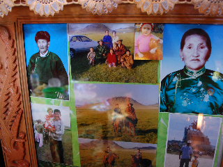 Mel joins a Mongolian family photo frame (upper-left, near matriarch)